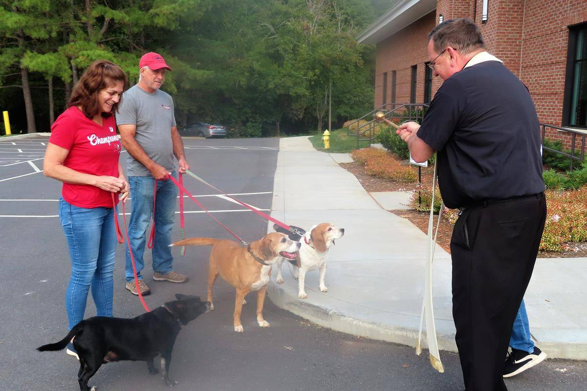 Father Thomas J. Kessler, pastor, blessed animals at St. Philip the Apostle Church in Statesville. (Photos provided by Connie Ries)