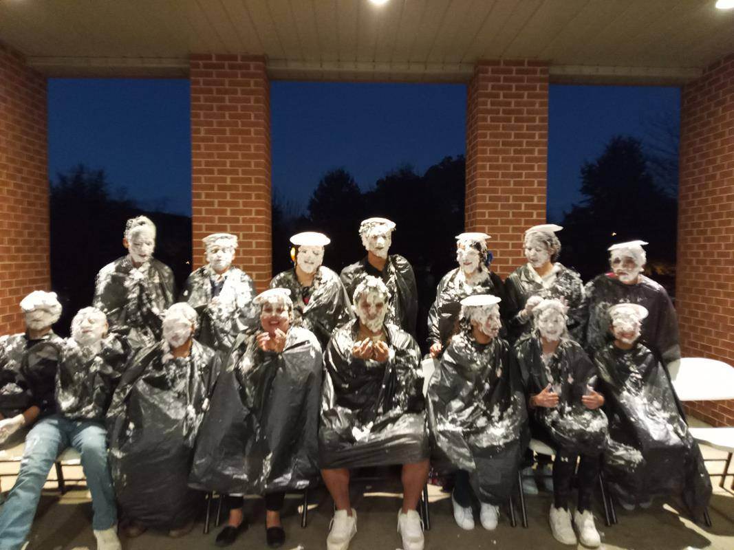 Near the end of the evening, youth group members were pied by those willing to donate $2 per