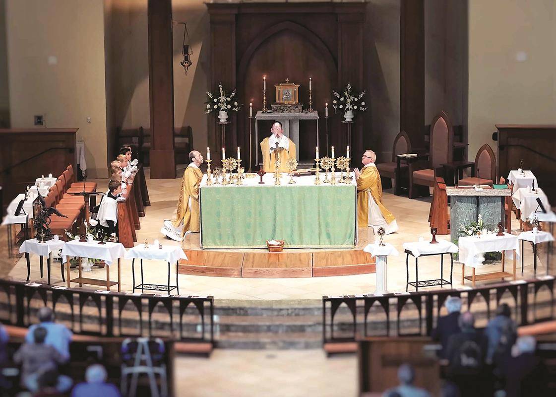 Father John Putnam, pastor, celebrated the All Saints Day Mass assisted by Deacons Rich McCarron and Tom McMahon.