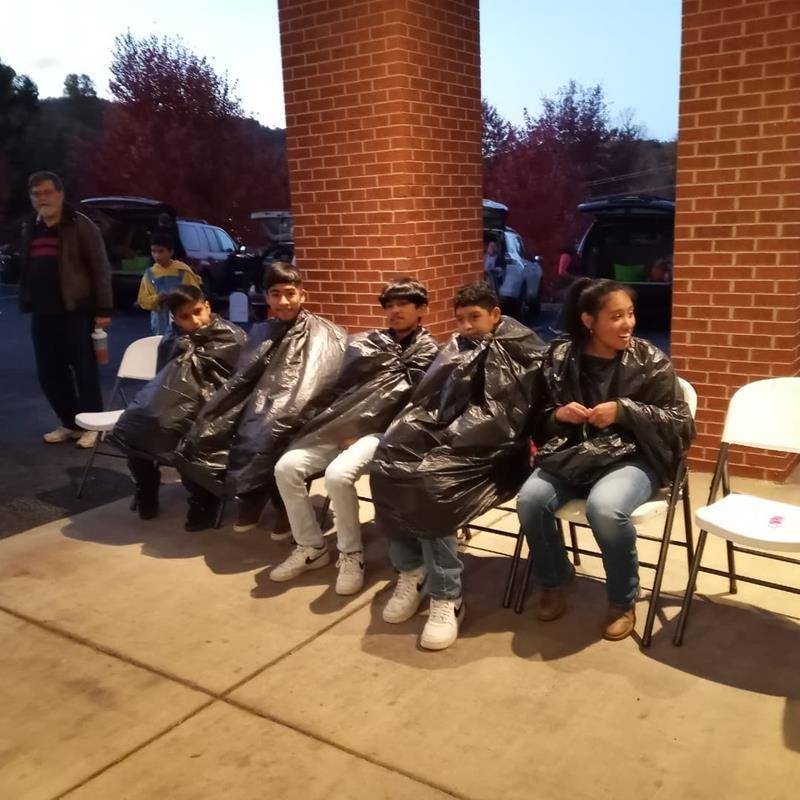 St. John the Evangelist high school youth group, with the help of parishioners, sponsored Trunk or Treat and a Saint party. After going car to car, youngsters were treated to Saint BINGO and other games. Everyone enjoyed pizza and drinks.