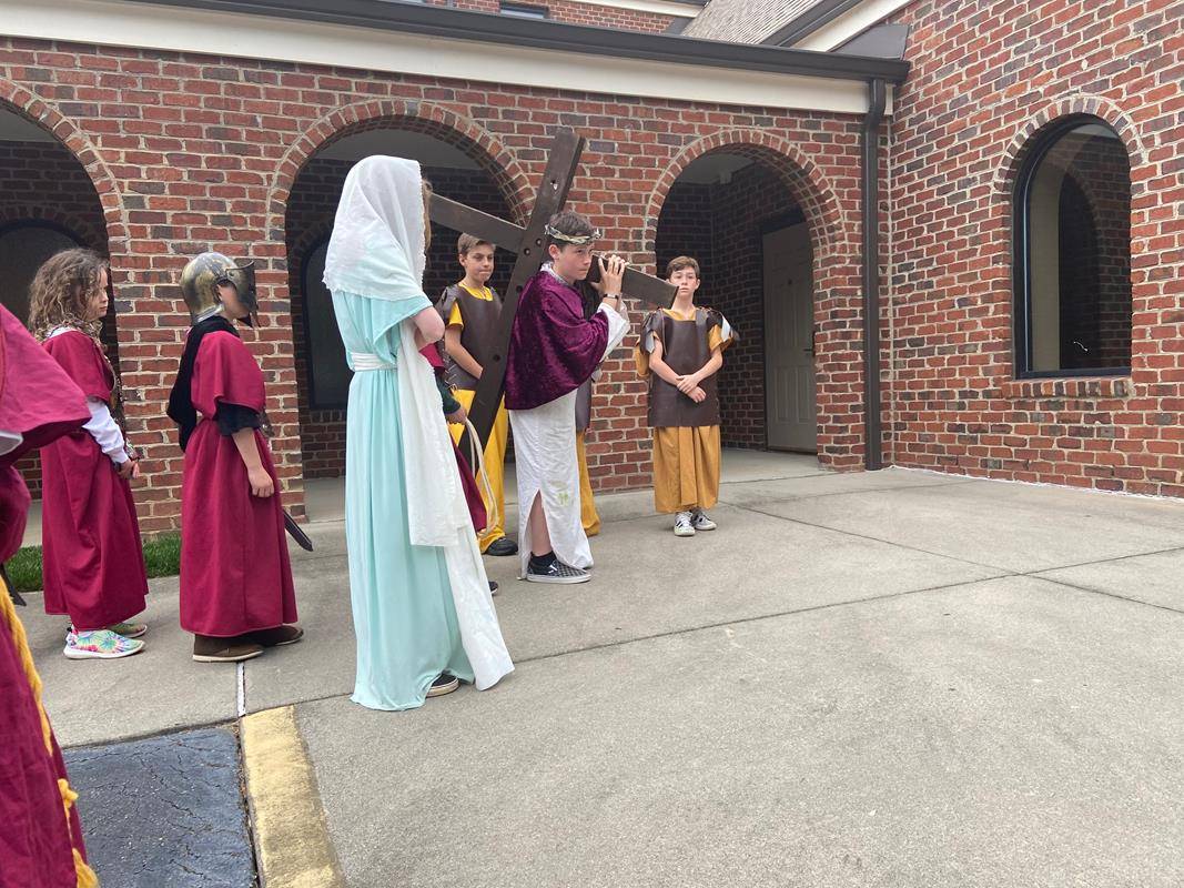 St. Michael School third and sixth grade classes performed a Living Stations of the Cross. (Photo via Facebook)
