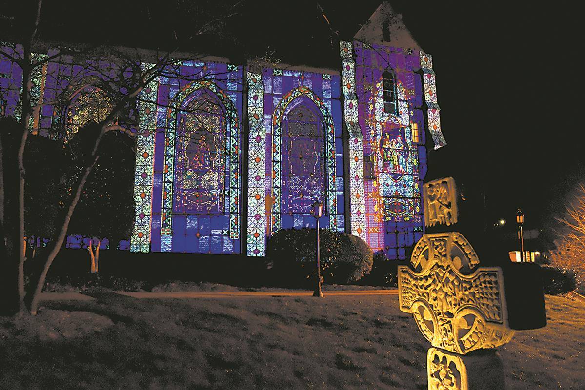 St. Patrick Cathedral in Charlotte lit up.