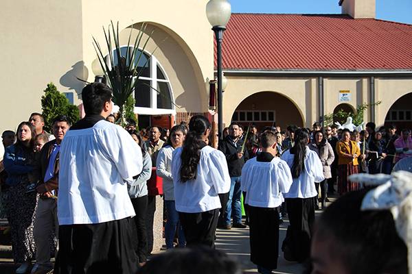 Palm Sunday procession outside Divine Redeemer Church in Boonville. (Sergio Garcia)