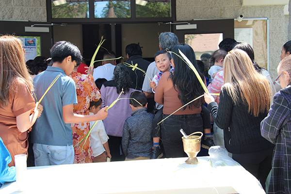 Palm Sunday procession at Holy Angels Church in Mount Airy. (Sergio Garcia)
