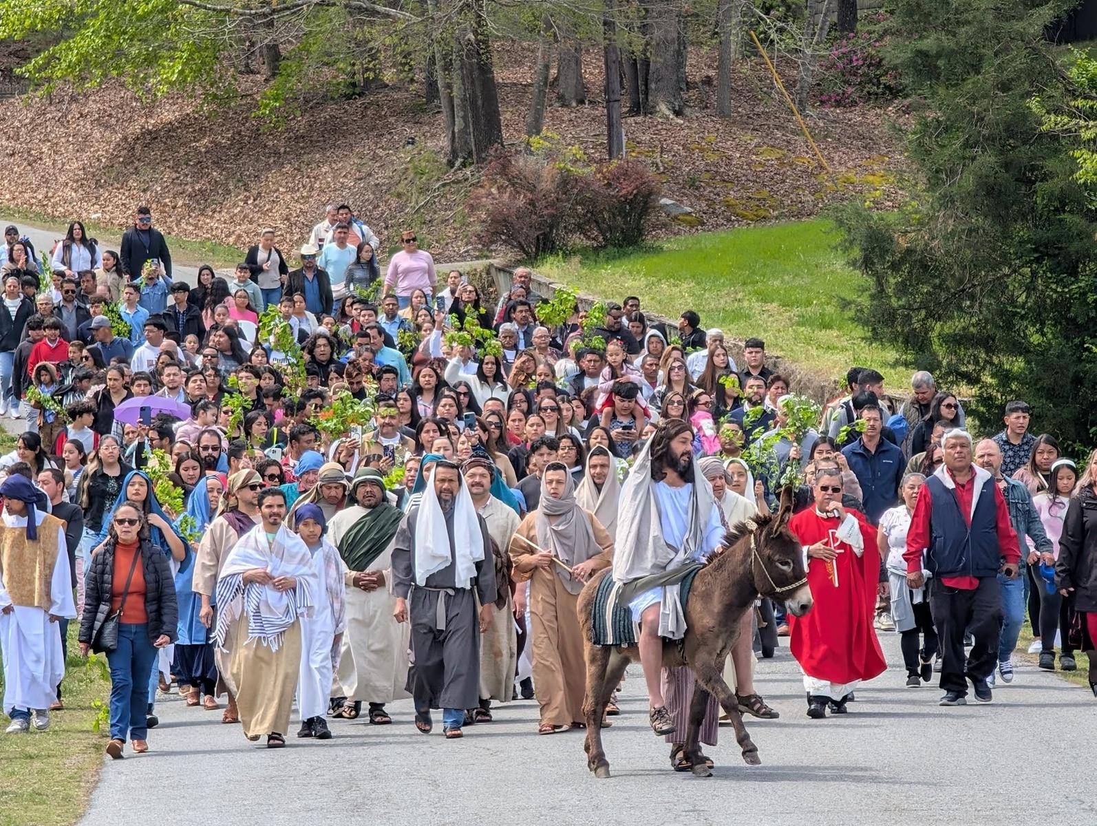 More than 500 people attended the Palm Sunday noon Mass at Our Lady of the Highways. (Photo provided)