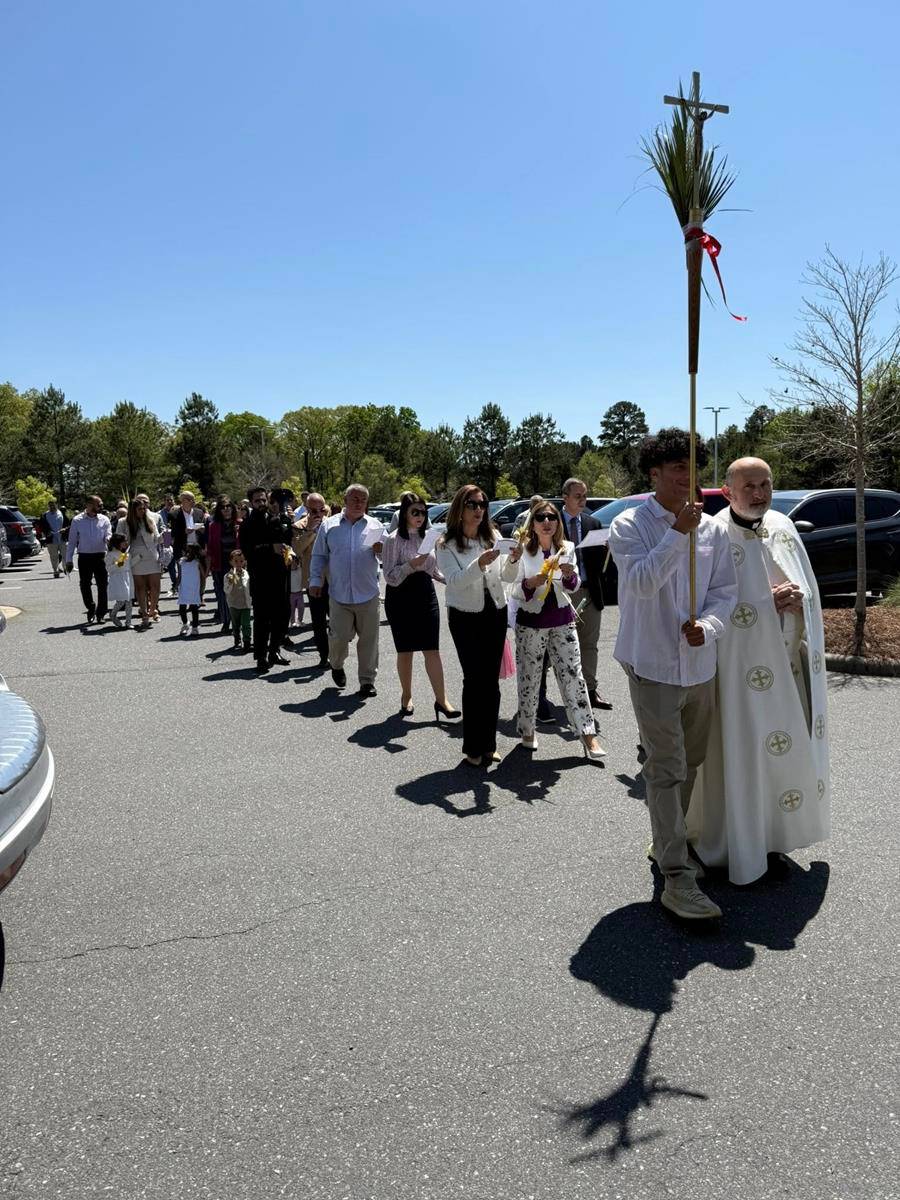Faithful at St. Stephen Maronite Catholic Church celebrate Palm Sunday with a procession. (Provided photo)