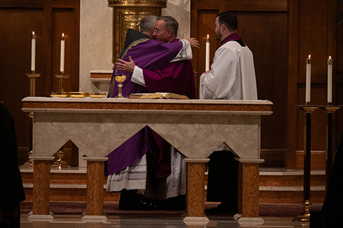 122724 Bishop Mass Greensboro Holy Family dinner Dec 7. 4
