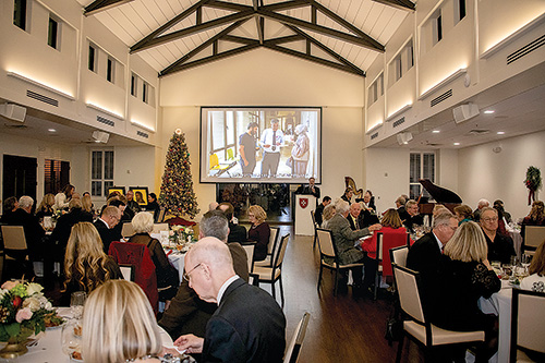 122724 Bishop Mass Greensboro Holy Family dinner Dec 7. 5