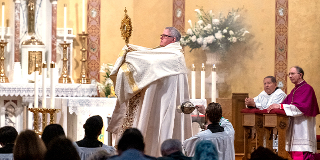 Two bishops pray